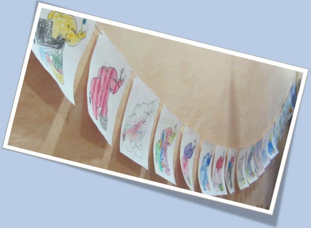 Selbstgemalte Elefantenbilder von Kindern mit dem Elefantenlogo der Kinderzahnarztpraxis Ralf Gudden in Krefeld